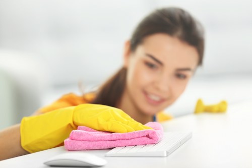 Cleaner restoring carpets in a busy Rayners Lane retail space